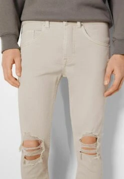BERSHKA RIPPED - Jeans Slim Fit - Beige 10 BERSHKA RIPPED - Jeans Slim Fit - Beige -Bershka Verkaufsgeschäft 0506c26570a446dc811177fc4b092c42