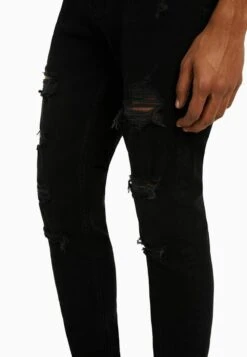 BERSHKA SUPER RIPPED - Jeans Slim Fit - Black 10 BERSHKA SUPER RIPPED - Jeans Slim Fit - Black -Bershka Verkaufsgeschäft 5d52ed80d1e24860a5baa0405ed91870