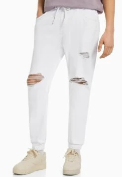 BERSHKA COLOURED - Jeans Tapered Fit - Off White