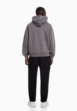 BERSHKA STOPPERS - Cargohose - Black -Bershka Verkaufsgeschäft 68e616e25ca74205b031f2a7f61dd19e