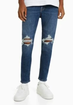 BERSHKA RIPPED CARROT FIT - Jeans Slim Fit - Dark Blue -Bershka Verkaufsgeschäft 71346770b830452091cddb64e12638d1 1