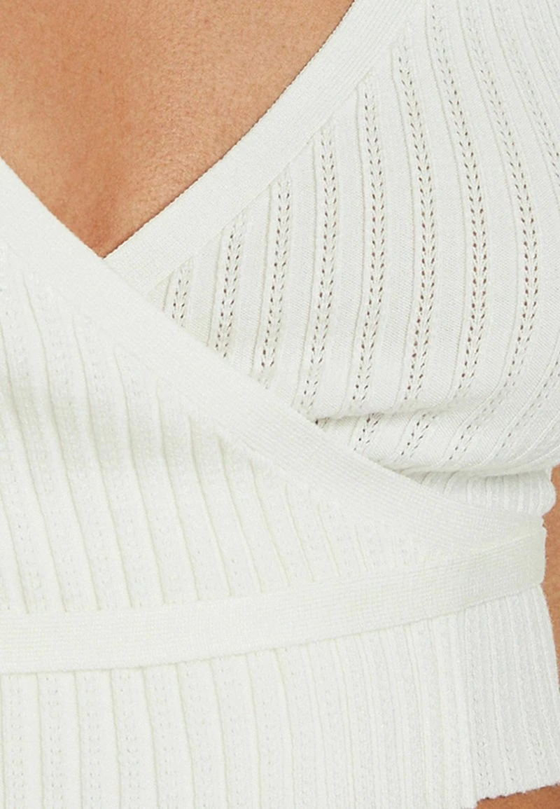 BERSHKA SHORT SLEEVE CROSSOVER WITH BOW - Strickjacke - Beige 7 BERSHKA SHORT SLEEVE CROSSOVER WITH BOW - Strickjacke - Beige – Bild 5