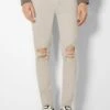 BERSHKA RIPPED - Jeans Slim Fit - Beige