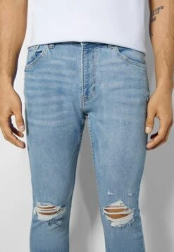 BERSHKA RIPPED - Jeans Skinny Fit - Light Blue Denim -Bershka Verkaufsgeschäft e205e1bf26bf4c168b50acc907275dea
